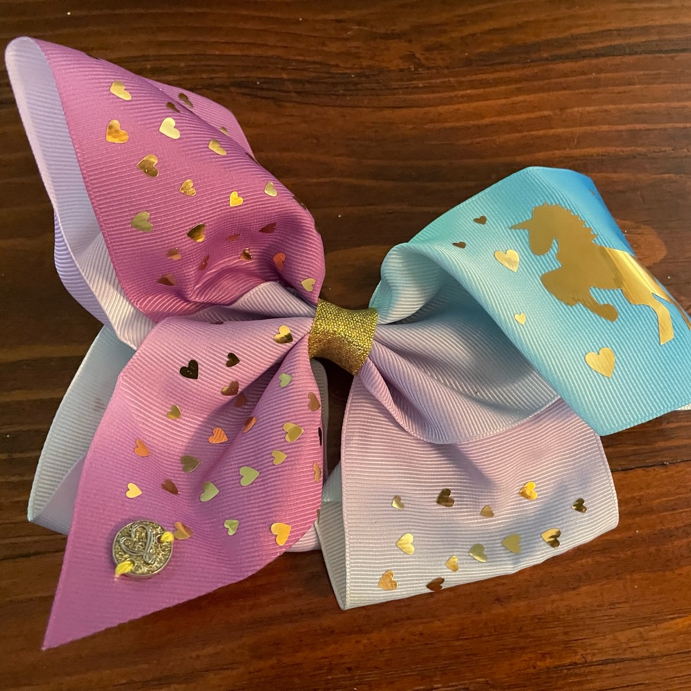 Jojo Siwa signature collection Unicorn and Hearts Bow hair clip.